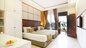 Twin Room, Pool View | Minibar, laptop workspace, free WiFi, bed sheets