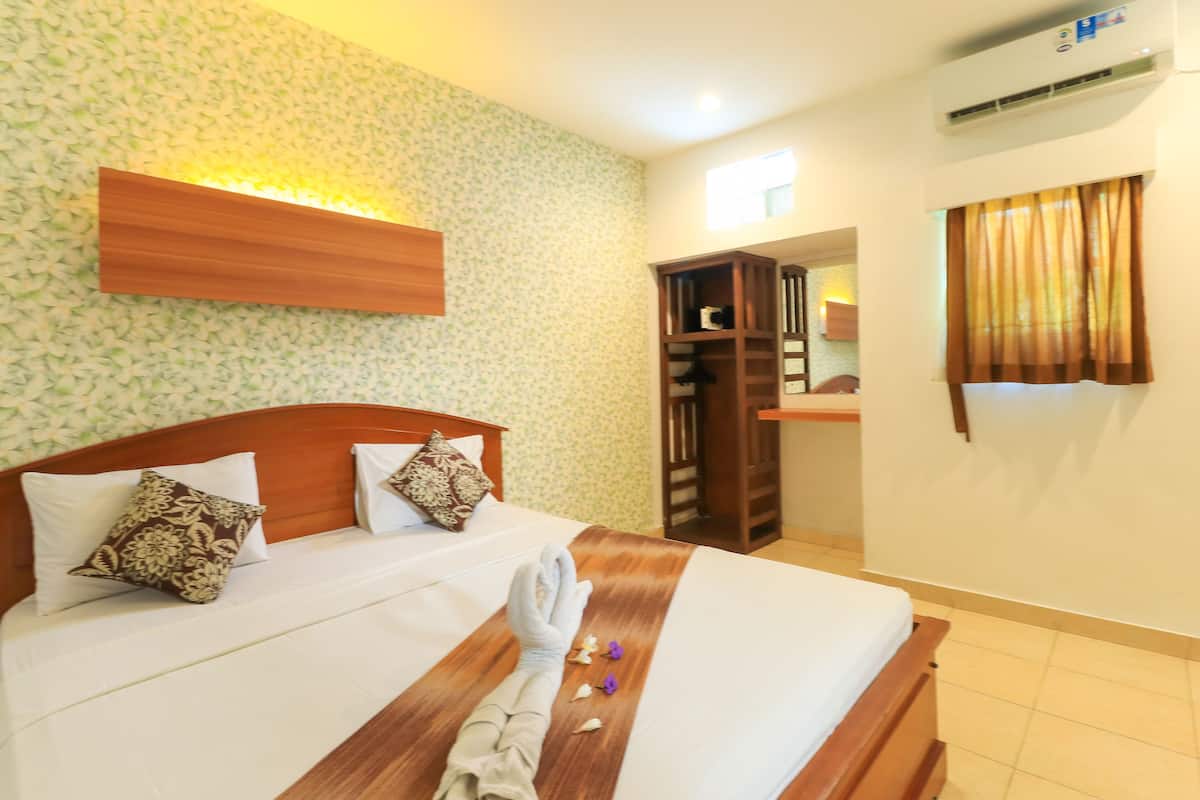 Cottage Tiêu chuẩn (with AC) | Bàn, giường gấp/giường phụ (phụ phí) 