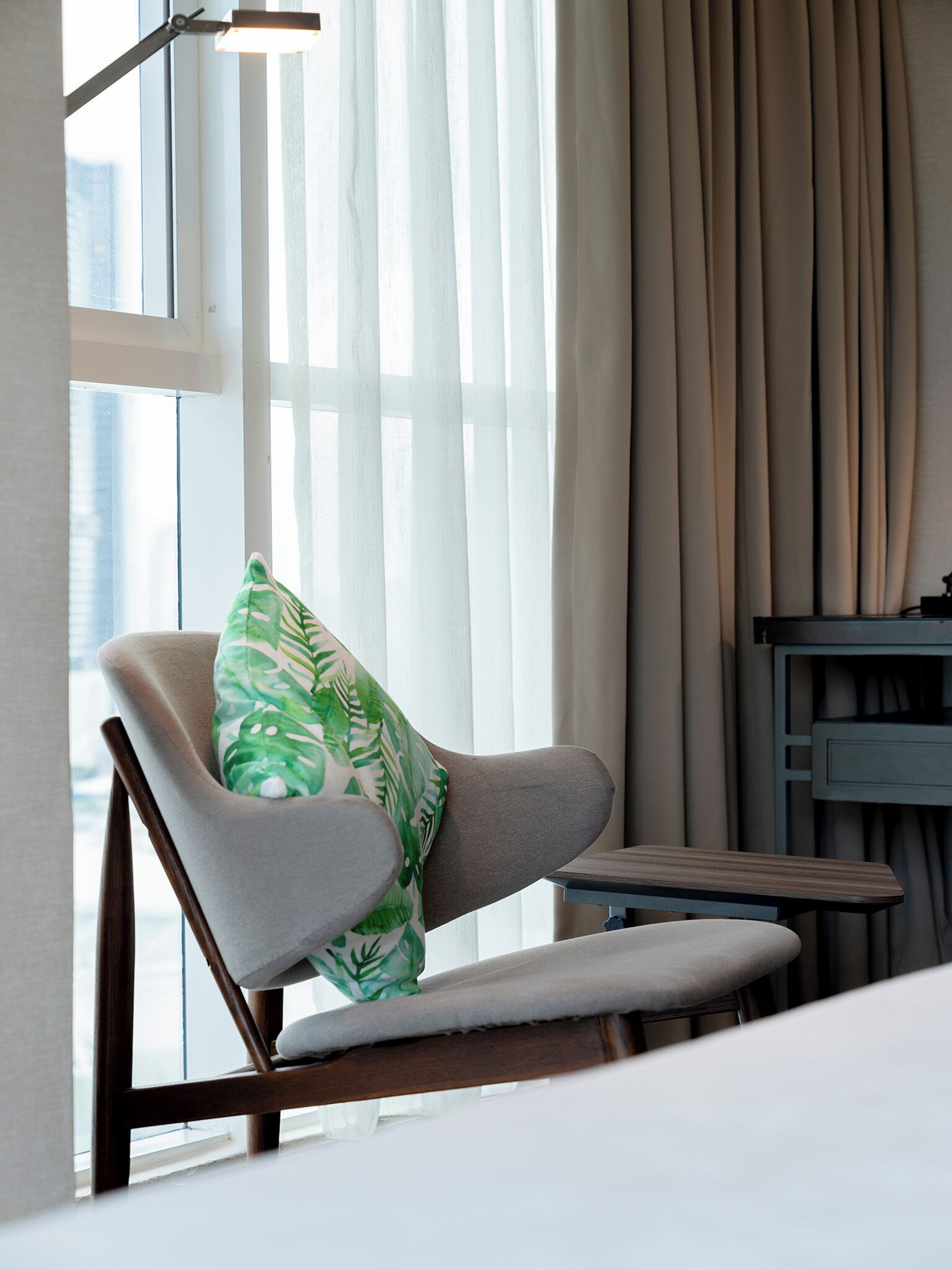 olive deluxe room | premium bedding, in-room safe, desk, laptop workspace