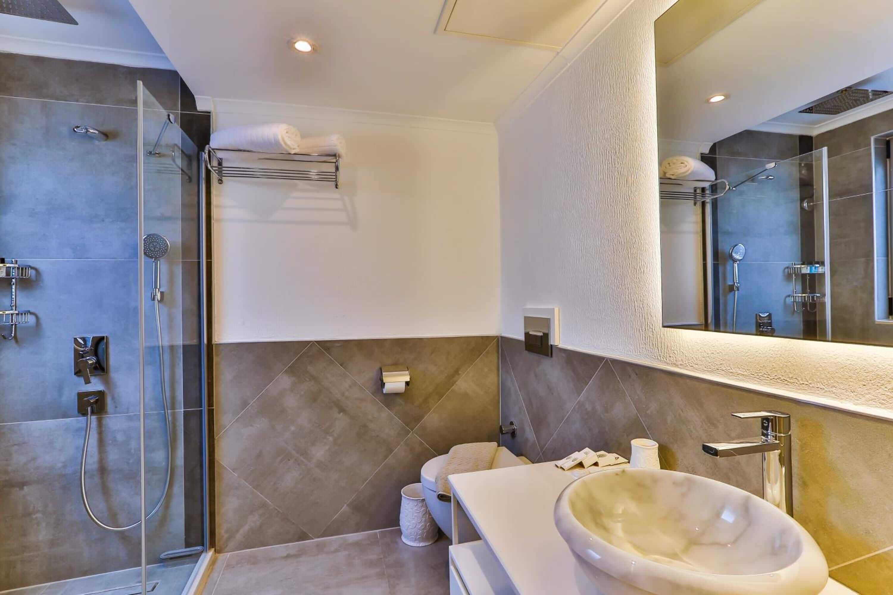 shower, free toiletries, hair dryer, bathrobes