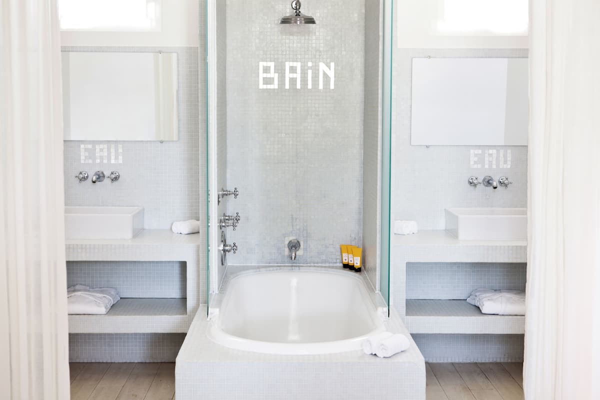 suite 4  | bathroom | designer toiletries, hair dryer, bathrobes, slippers