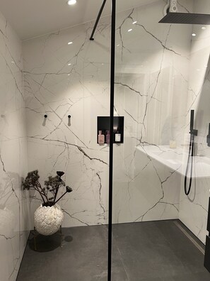 Exclusive Apartment | Bathroom | Shower, free toiletries, hair dryer, soap