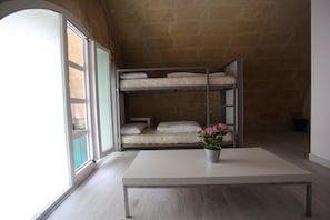 Family Shared Dormitory, Private Bathroom (4 beds) | Iron/ironing board, free WiFi - Ostello dei Sassi Matera (Matera)