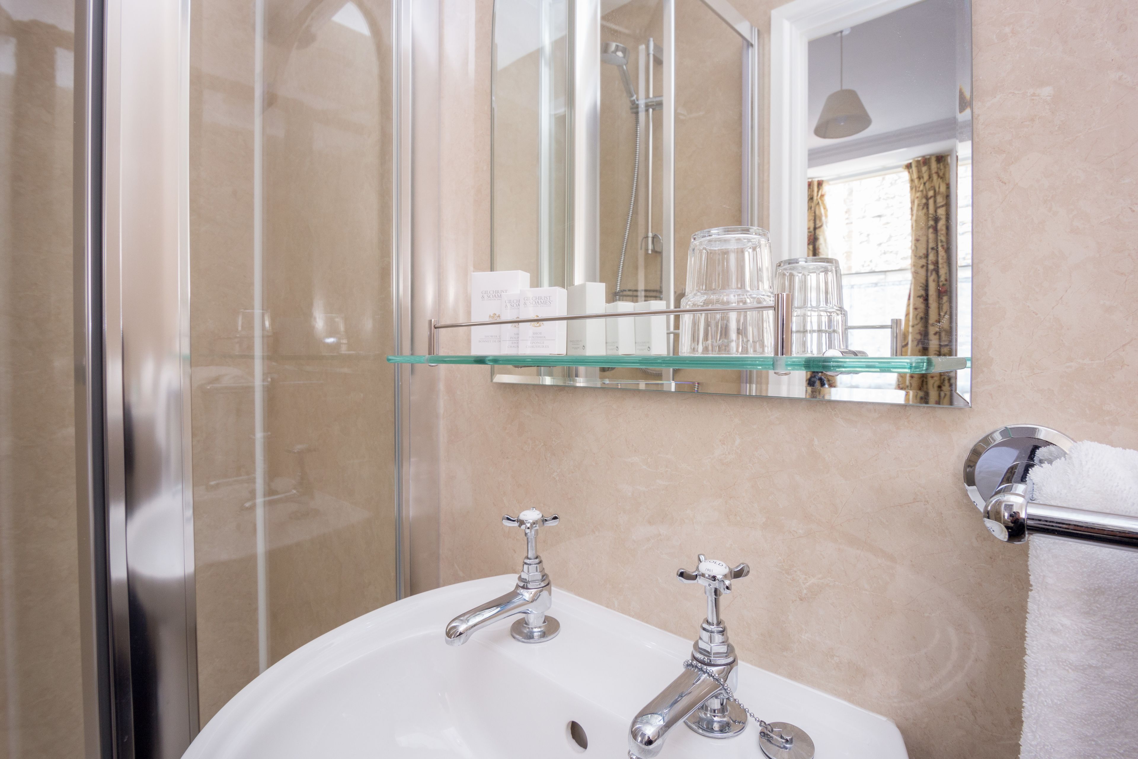 combined shower/bathtub, free toiletries, hair dryer, towels