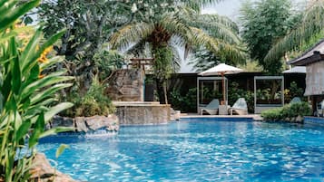 Outdoor pool, free pool cabanas, pool umbrellas