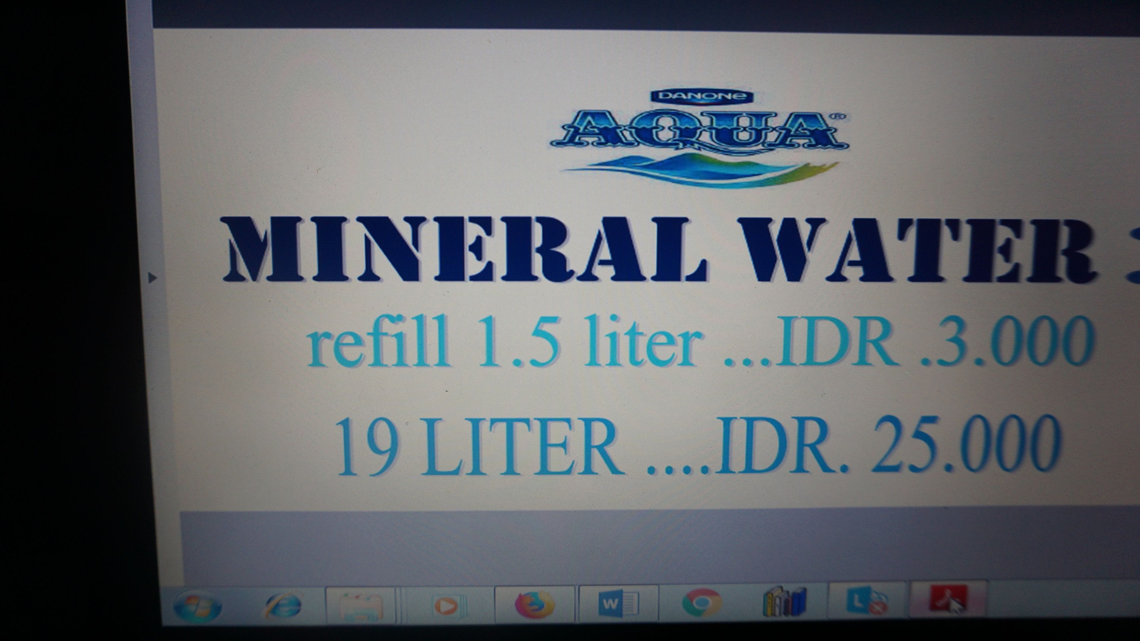 A computer screen displaying a mineral water advertisement with refill options.