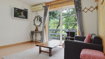 Family Double or Twin Room | Living area | LED TV