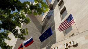 The exterior of the AM CENTRAL INN building with flags of the USA, EU, and Armenia. - Ani Central Inn (Yerevan)