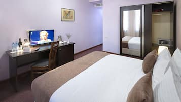 Ropa de cama de alta calidad y minibar