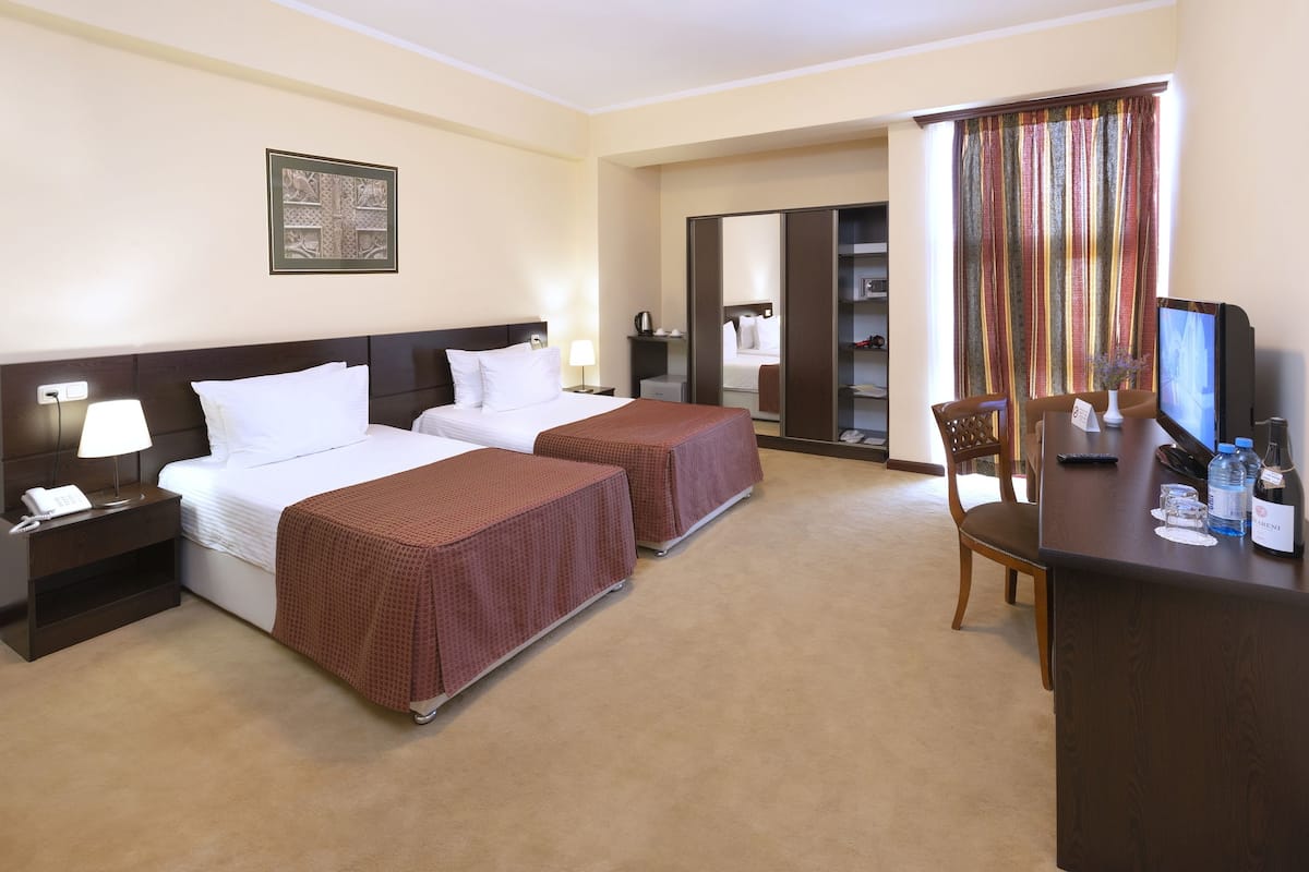 Standard Double or Twin Room | Living area | Flat-screen TV