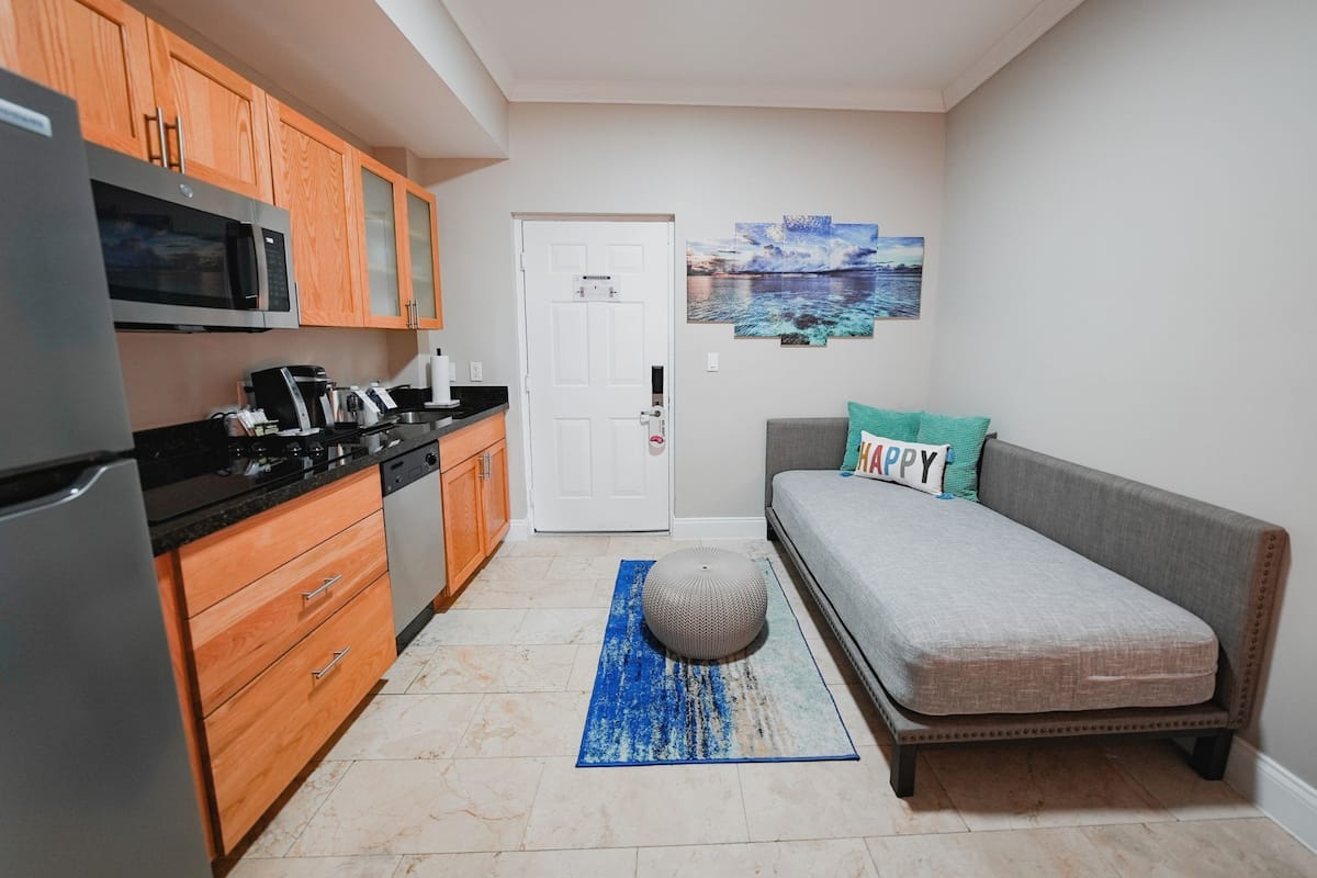 Executive Suite, 1 Bedroom, Kitchen | Living area | 42-inch LED TV with digital channels, TV