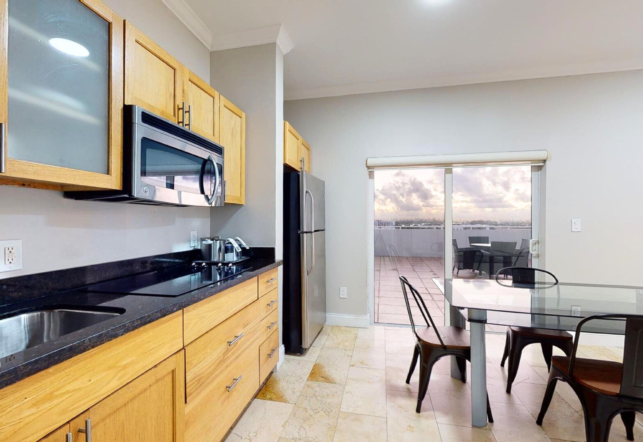 family suite, multiple beds | private kitchen | microwave, coffee/tea maker