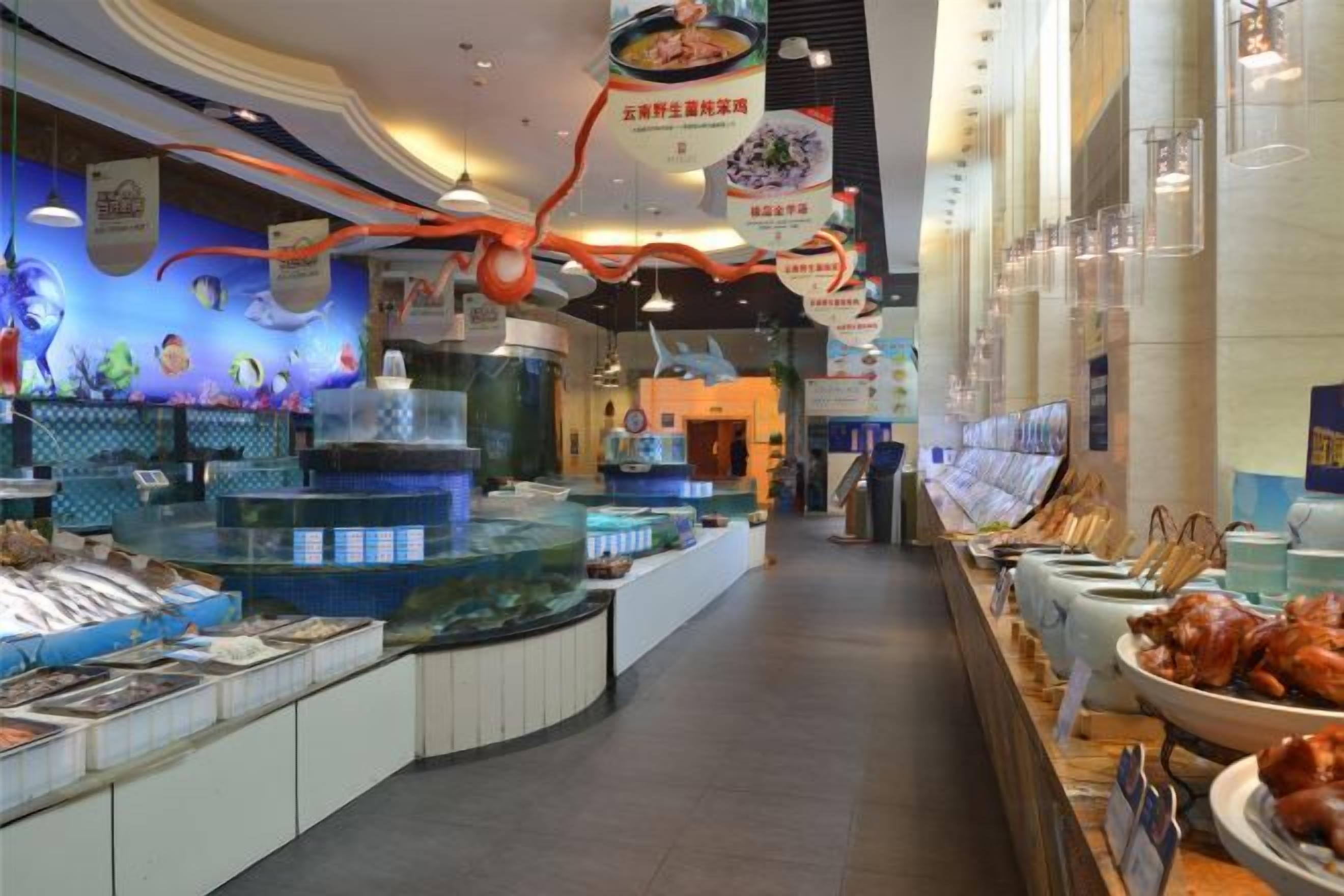 A seafood display with various fish and seafood items.