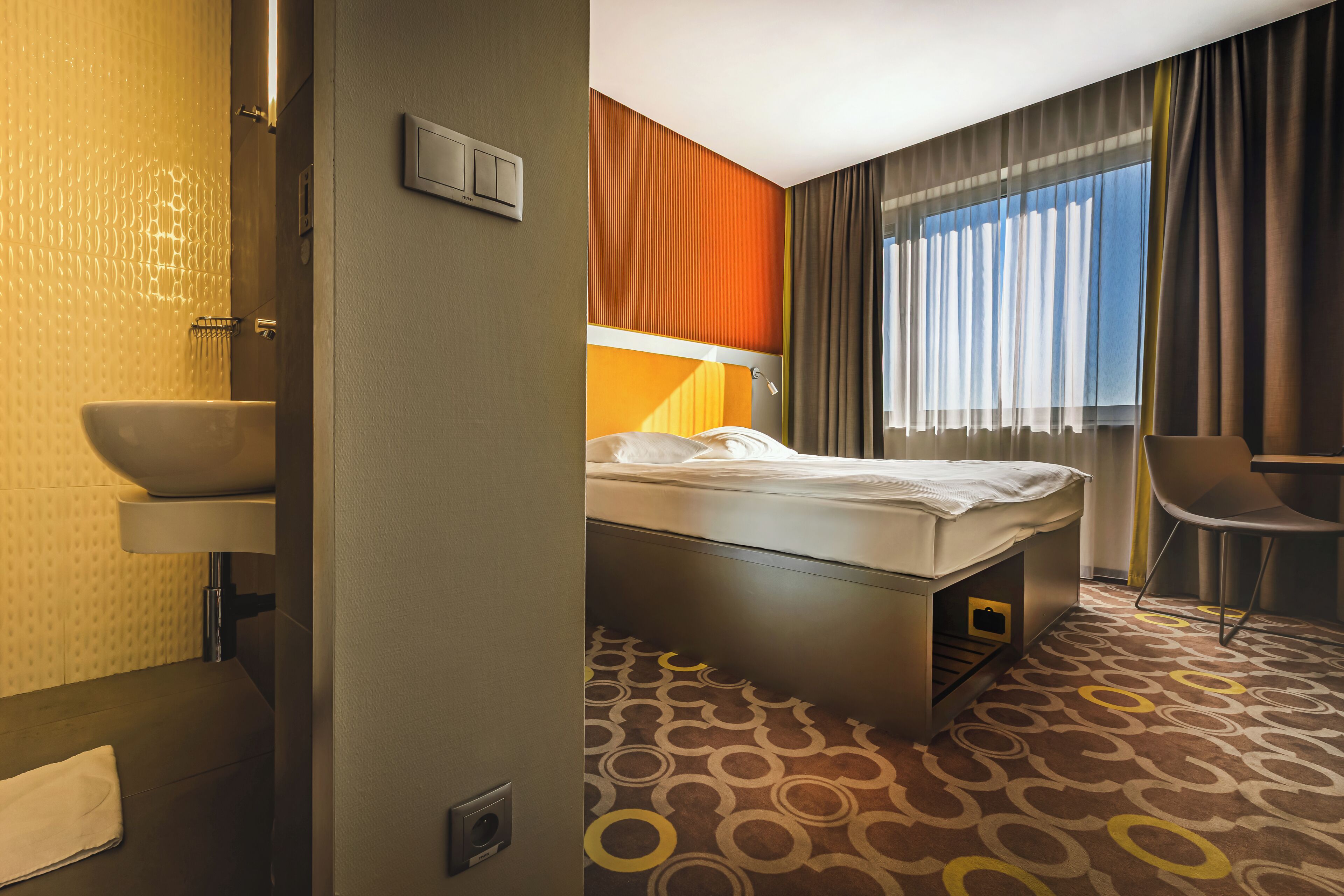 premium bedding, blackout curtains, soundproofing, iron/ironing board