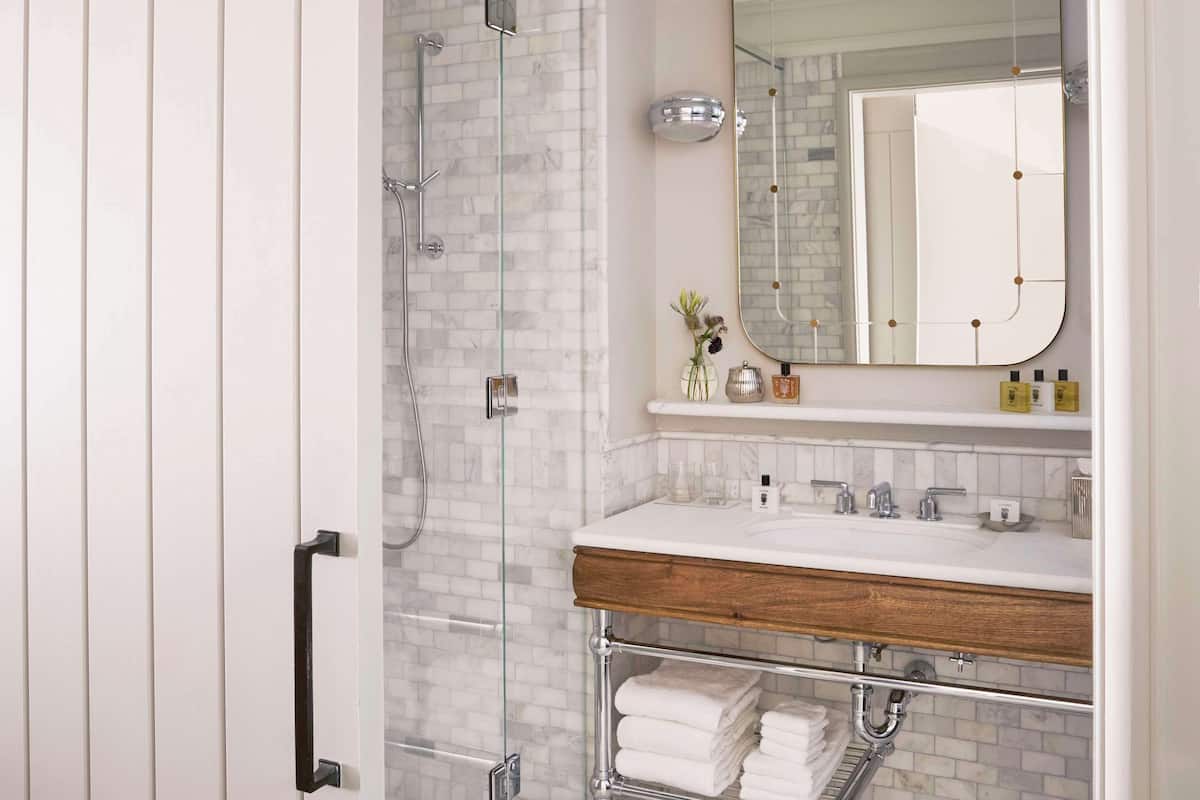 Designer toiletries, hair dryer, bathrobes, slippers