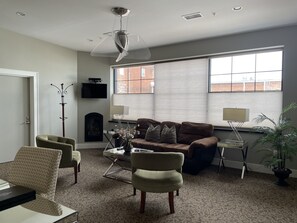 Luxury Suite, Kitchenette | Living area | TV - Culpeper Center Suites (Culpeper)