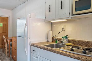 Quarto, 2 camas de casal, cozinha americana | Cozinha americana privada | Micro-ondas