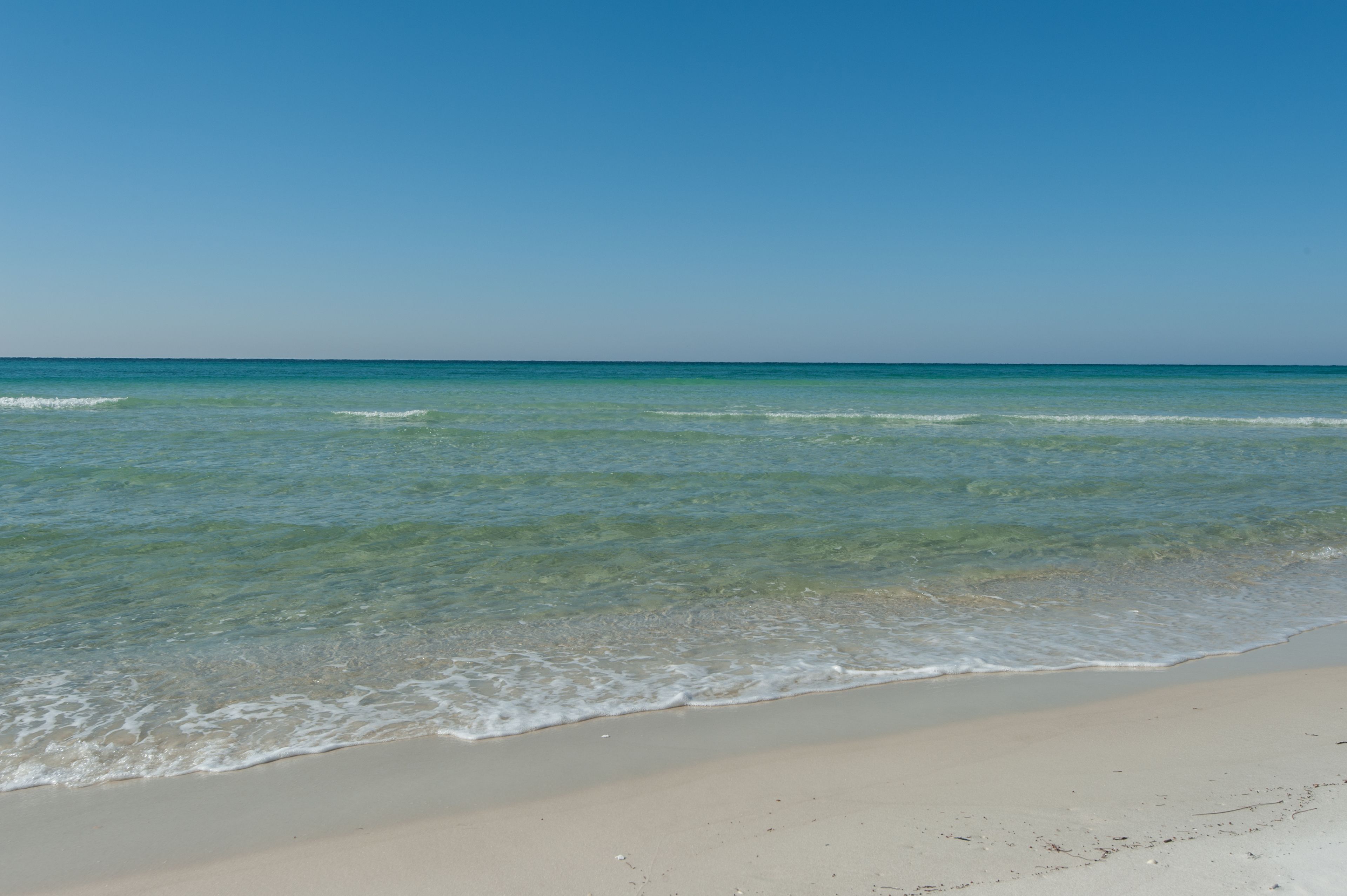 On the beach, white sand