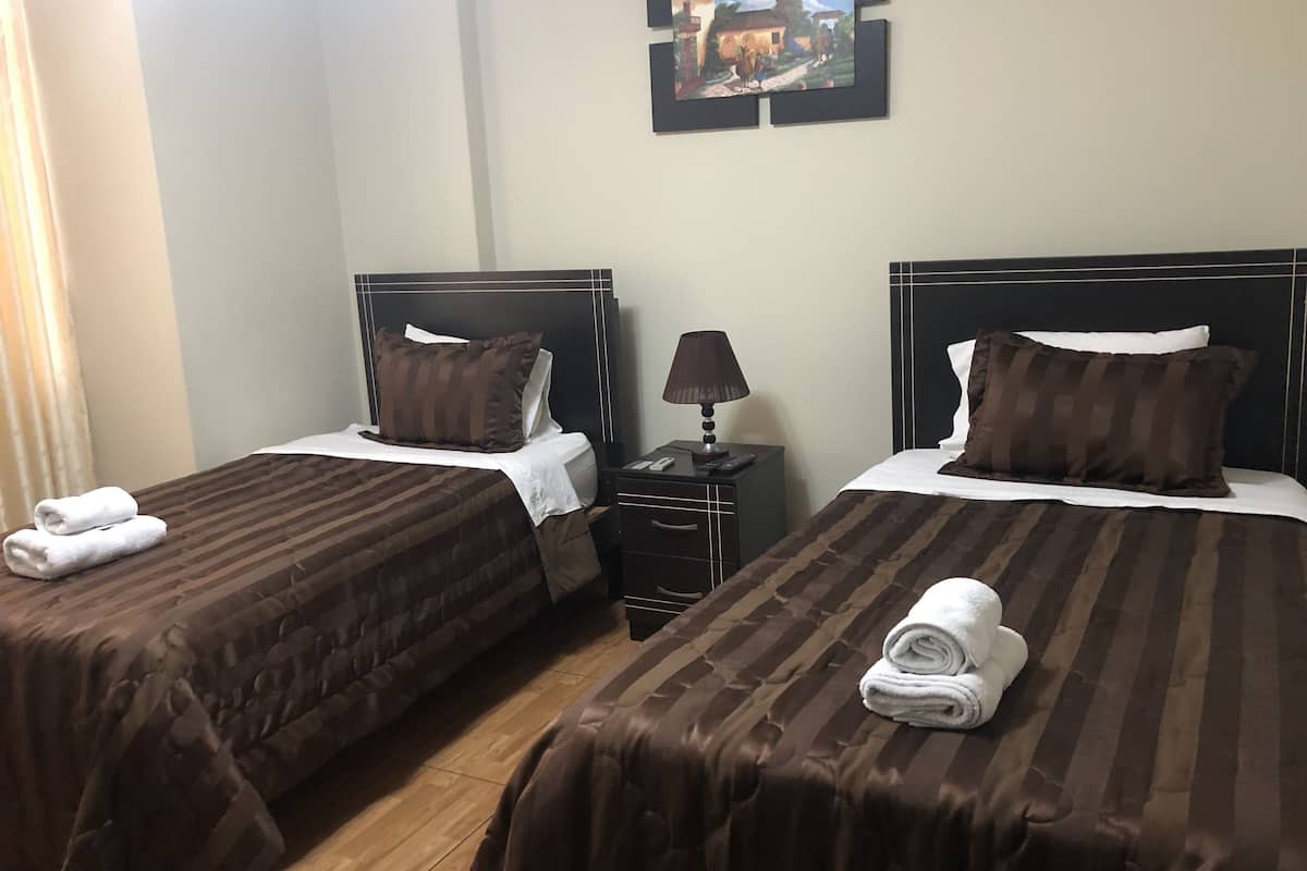 Double Room, 2 Single Beds, Shared Bathroom | Iron/ironing board (on request), free WiFi, bed sheets