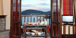 Suite exclusiva, chimenea, vista al lago | Vista desde la habitación