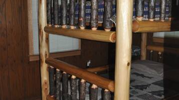 A bunk bed with wooden slats and a metal frame.
