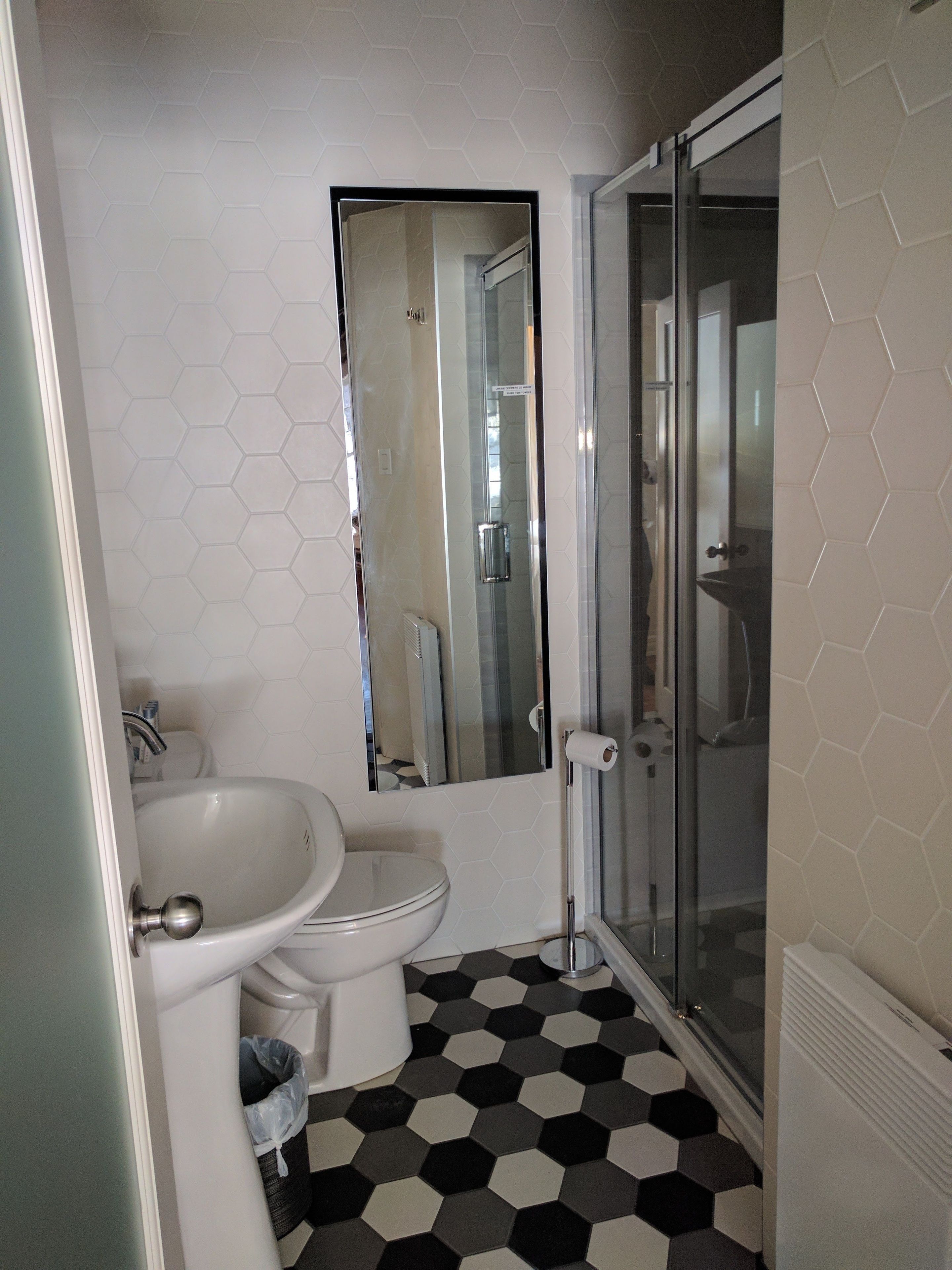 comfort triple room, multiple beds, park view | bathroom | free toiletries, hair dryer, towels