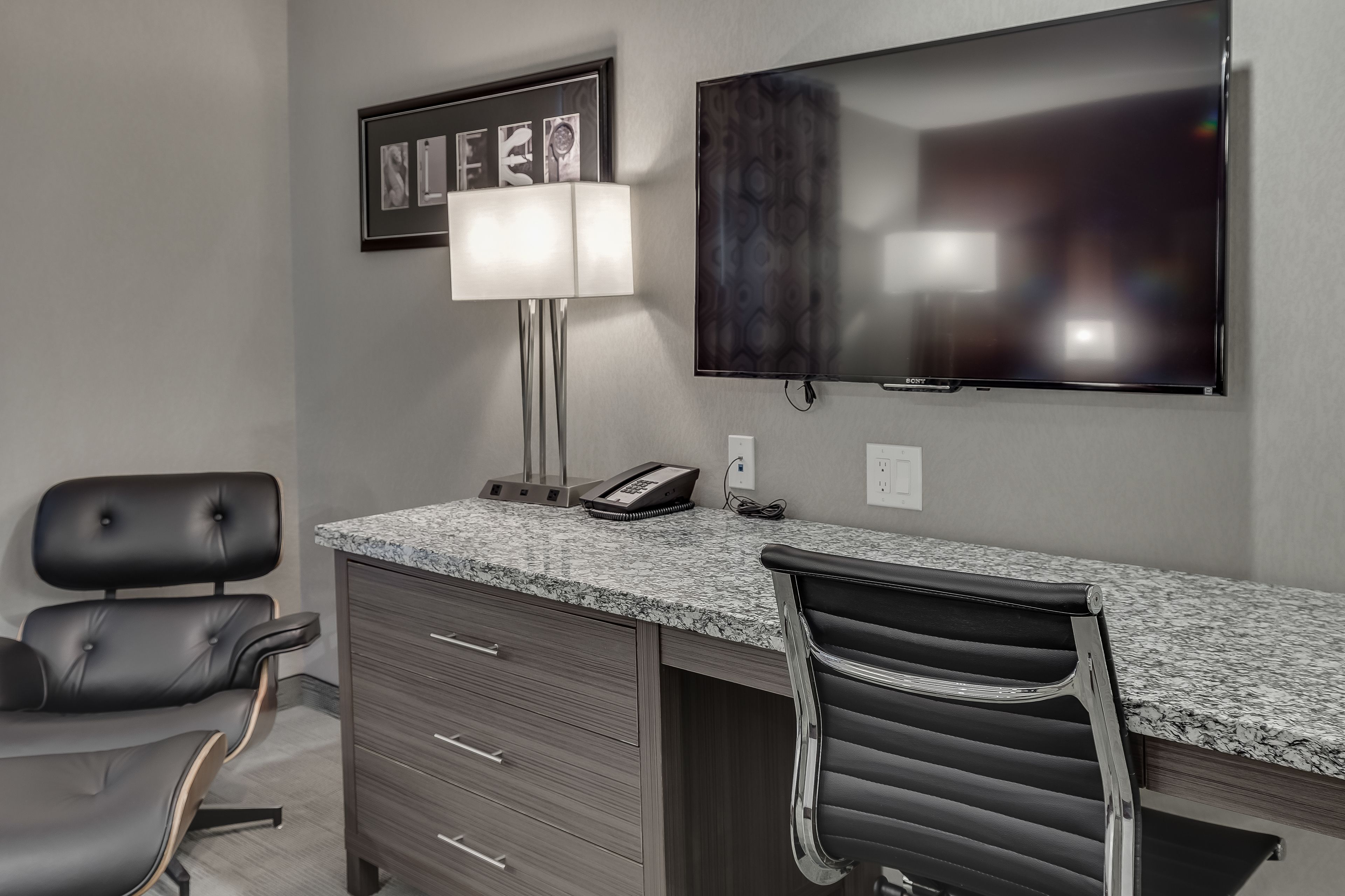 business suite, 1 king bed, kitchenette | 1 bedroom, premium bedding, desk, laptop workspace