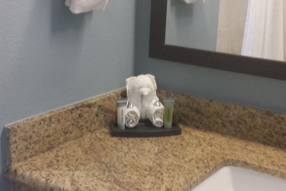 room, 2 queen beds | bathroom | combined shower/bathtub, free toiletries, hair dryer, towels