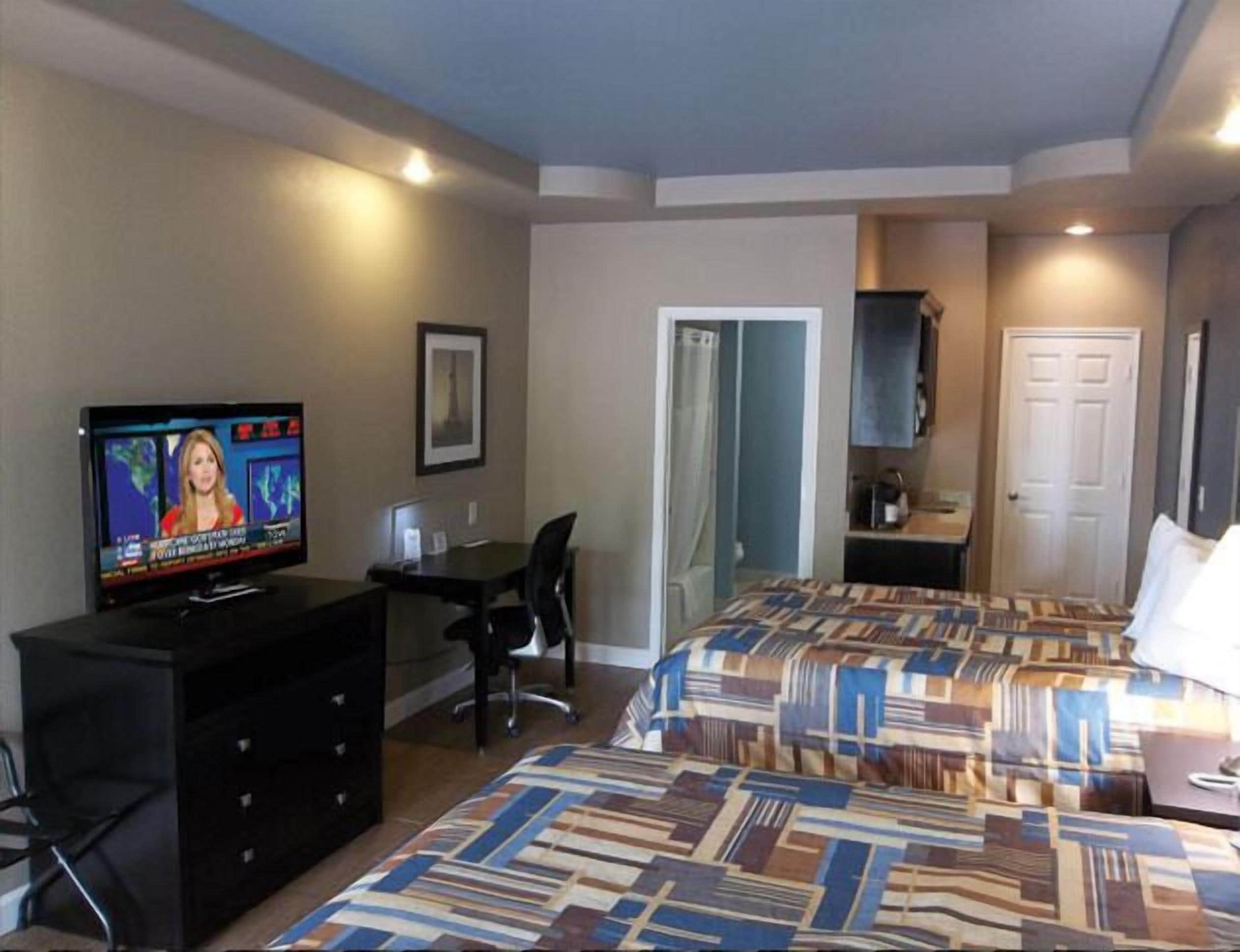 room, 2 queen beds | 1 bedroom, desk, iron/ironing board, free wired internet