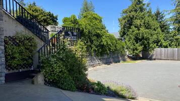 A stone staircase leading to a building with a sign reading "Eagle Rock".