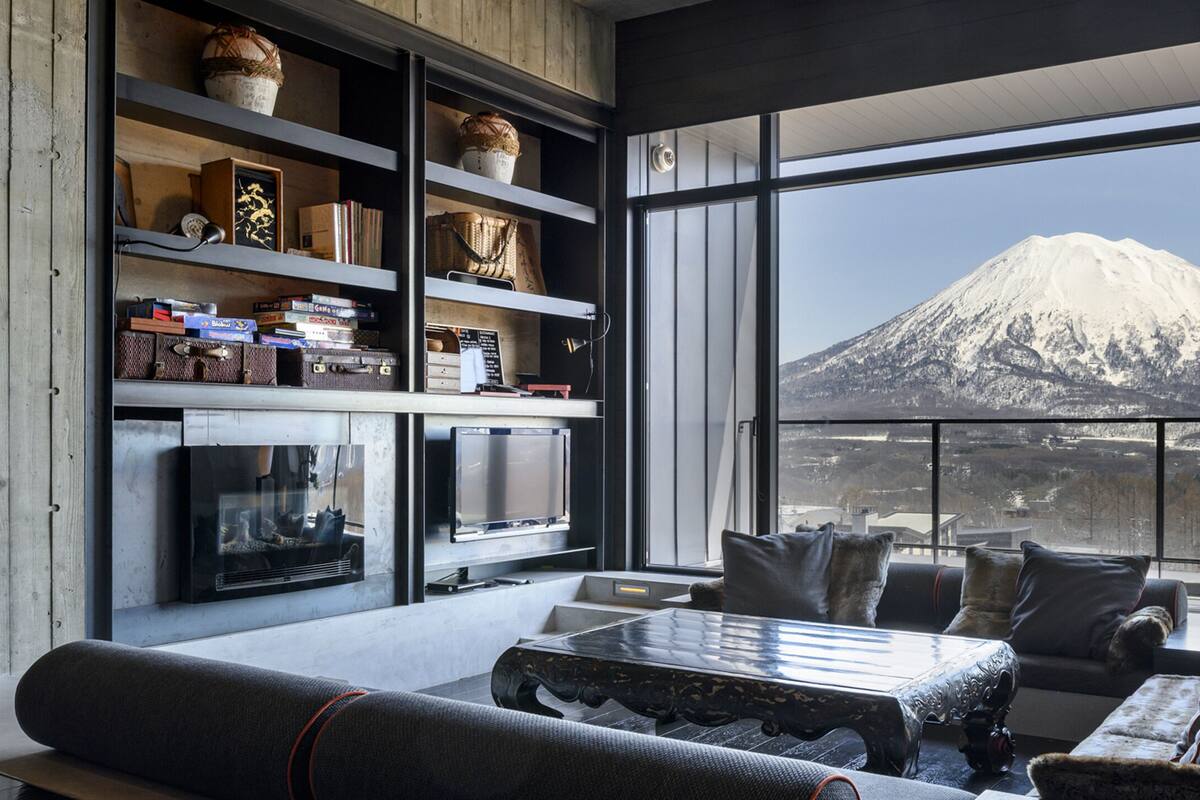 Luxury Suite, 5 Bedrooms | Living area | 43-inch flat-screen TV with satellite channels, TV, fireplace