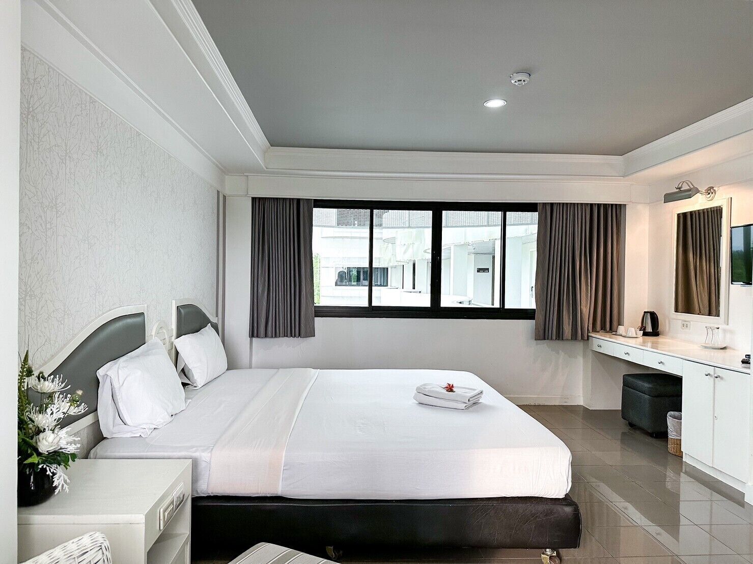 Desk, laptop workspace, blackout drapes, rollaway beds