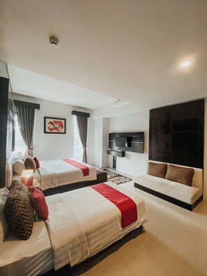 Executive Studio Suite | Premium bedding, desk, free WiFi, bed sheets - Prima Sr Hotel & Convention (Sleman)