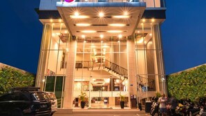 A modern building with a prominent sign reading "TIJOKROSTYLE". - Tjokro Style Yogyakarta (Yogyakarta)
