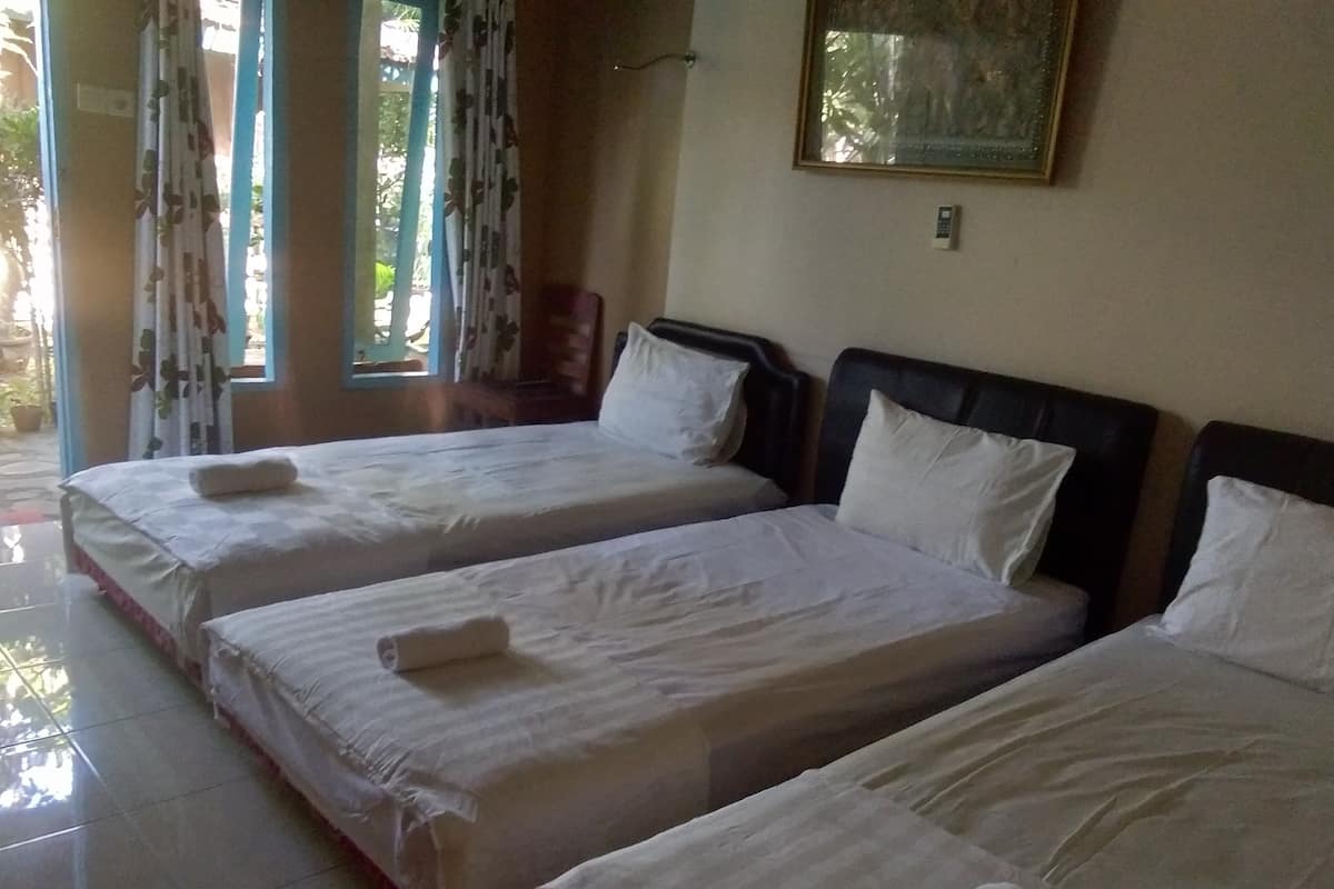 Standard Triple Room, Garden View | Free WiFi