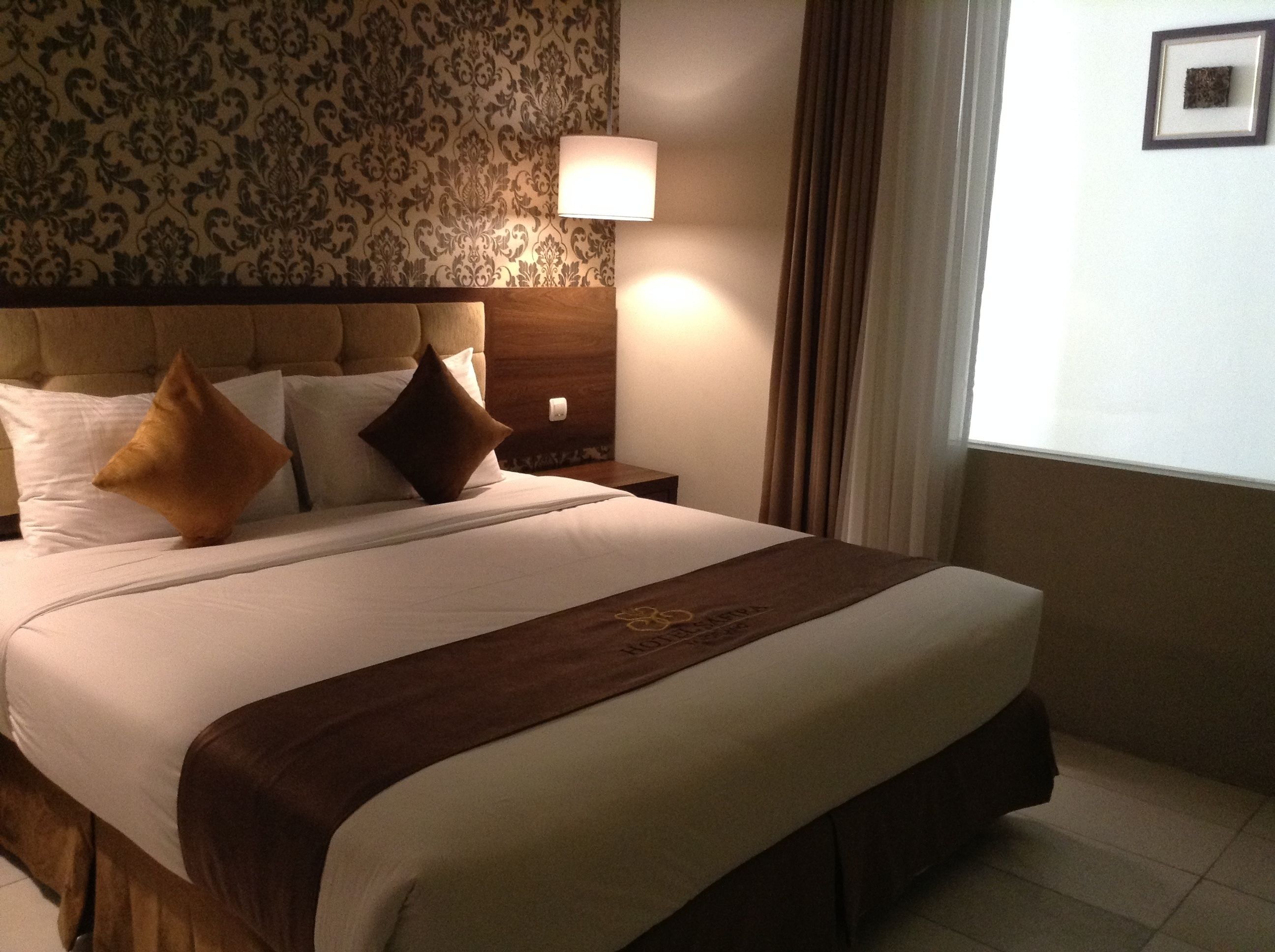 Kamar Superior, 1 Tempat Tidur King | Seprai premium, brankas, meja kerja, dan tirai kedap cahaya