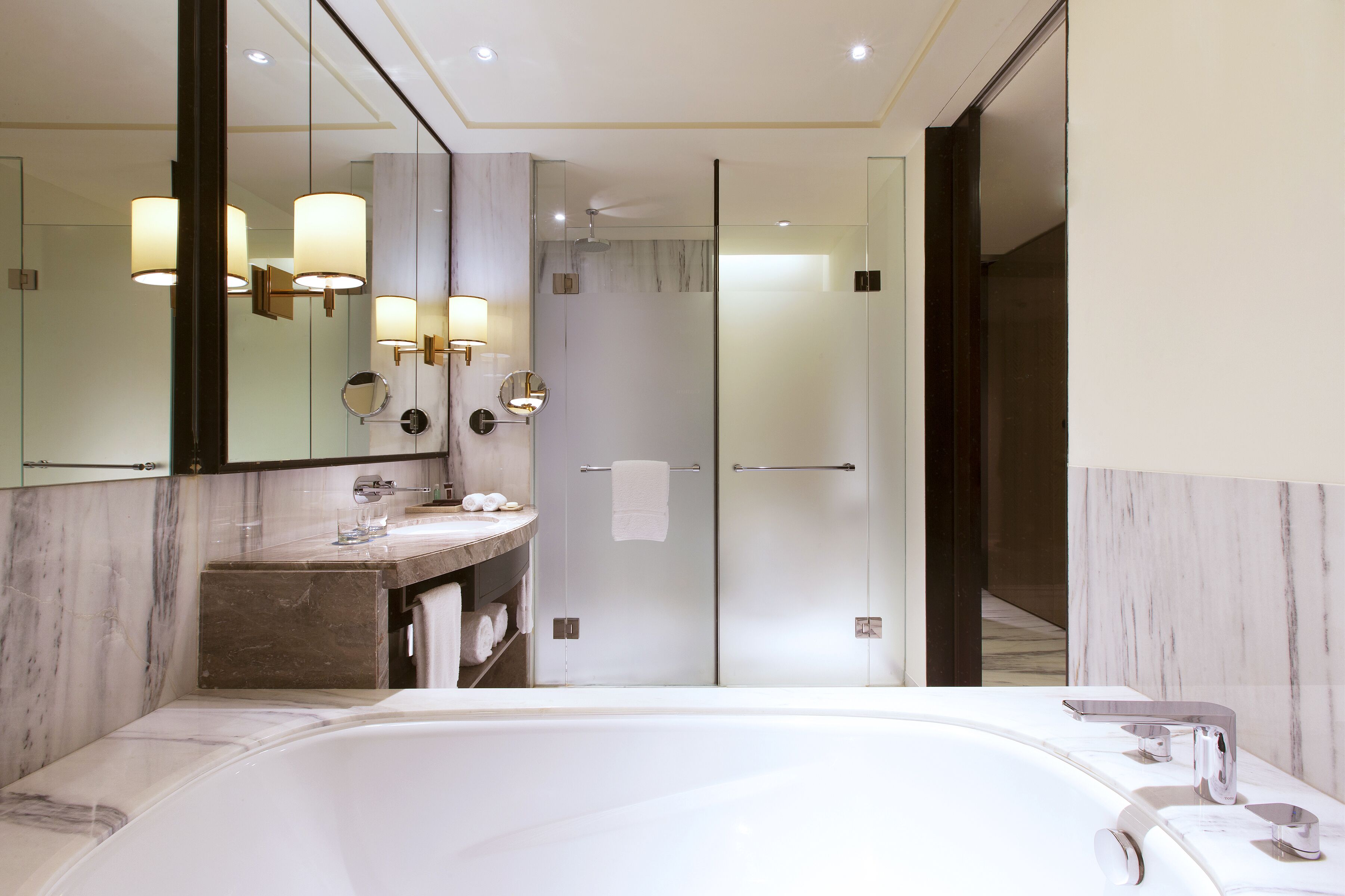 executive suite, 1 king bed (grand suite, club lounge access) | bathroom | separate bathtub and shower, rainfall showerhead, free toiletries