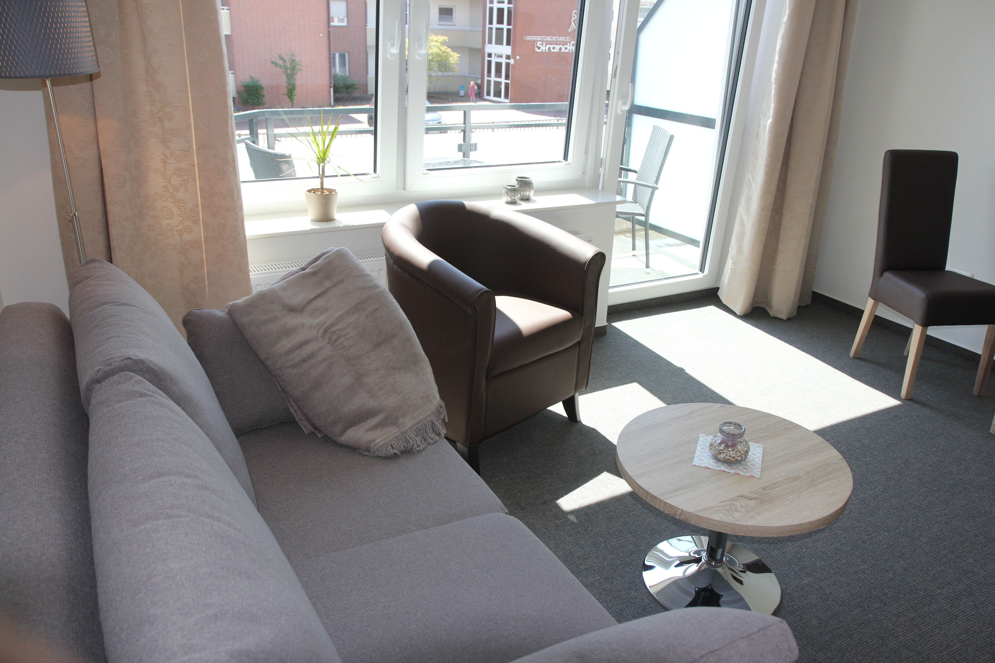 junior suite, 2 bedrooms | living area | flat-screen tv