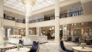 A grand lobby with marble floors, elegant chandeliers, and classic furniture. - Vinpearl Resort & Spa Ha Long  (Bai Chay)