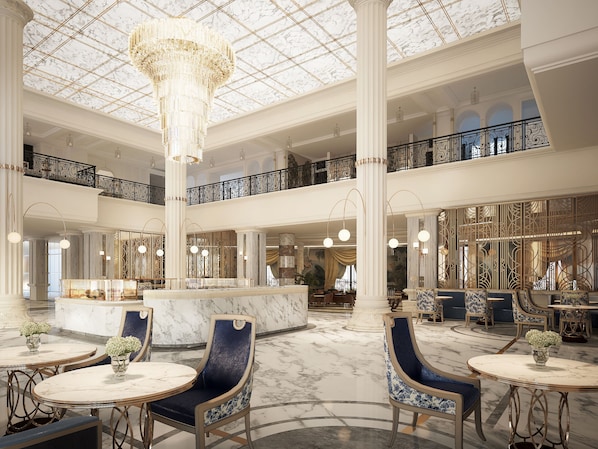 A grand lobby with marble floors, elegant chandeliers, and classic furniture. - Vinpearl Resort & Spa Ha Long (Bai Chay)