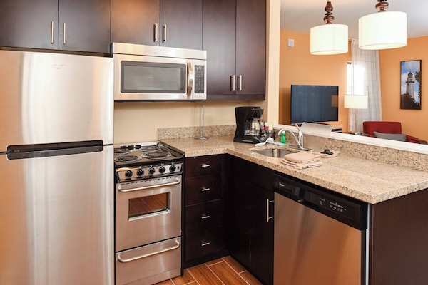 Desk, blackout drapes, iron/ironing board, free cribs/infant beds