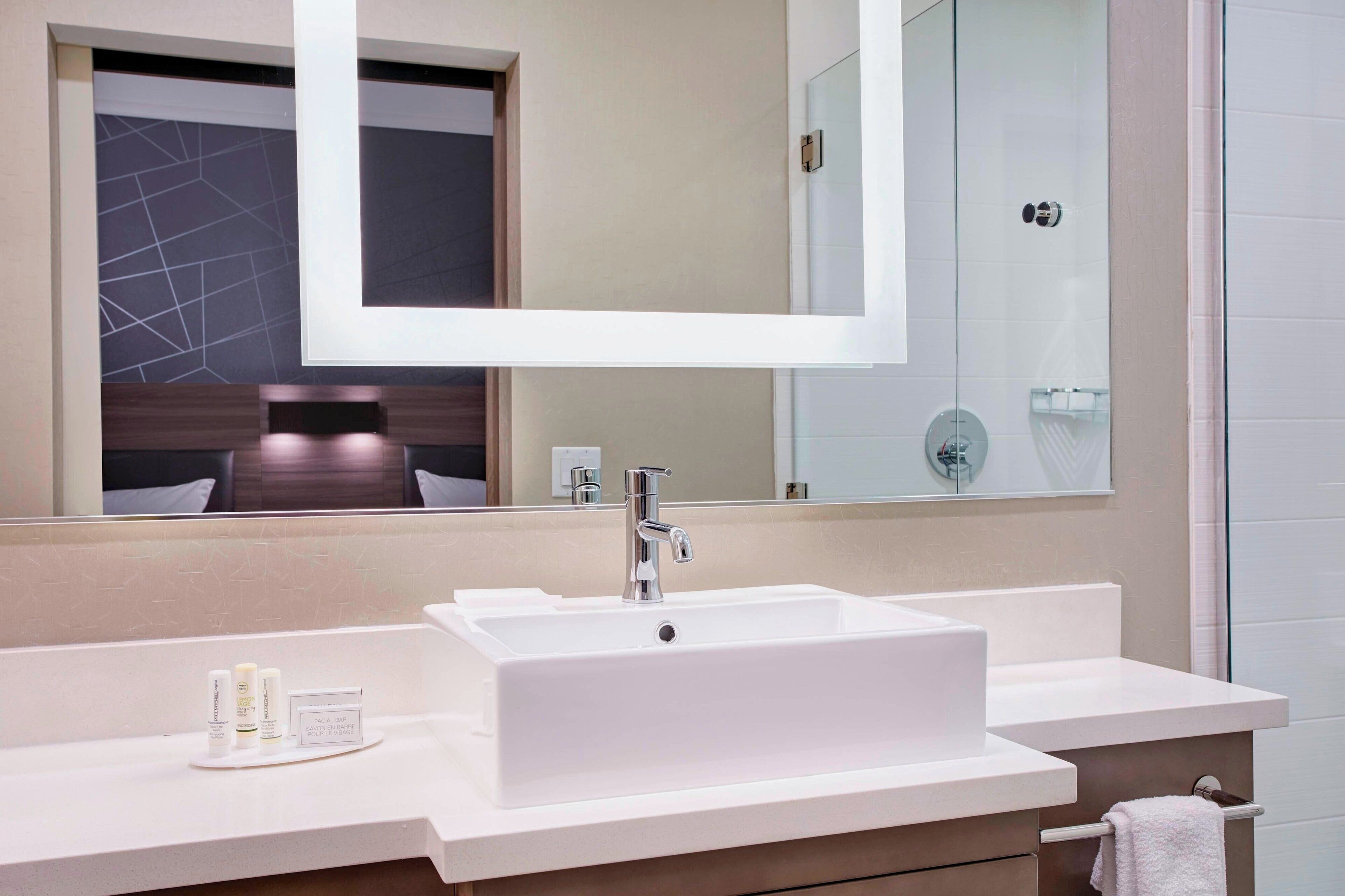 combined shower/bathtub, free toiletries, hair dryer, towels