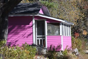 Lakefront Pink Cottage | 6 bedrooms, individually decorated, individually furnished, free WiFi