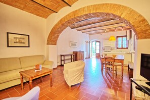 Apartment, 1 Bedroom (Tenuta 2) | Living area | TV - Tenuta (San Casciano in Val di Pesa)