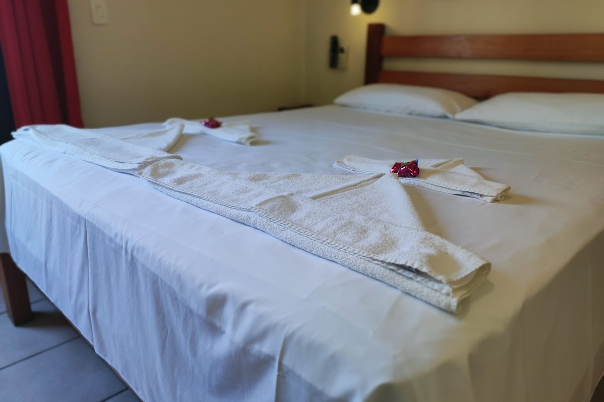 Suite, 1 letto queen | Minibar, Wi-Fi gratuito, lenzuola