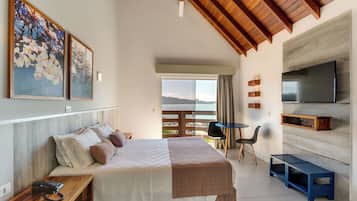 Apartamento, Vista para o mar | Roupas de cama premium, frigobar, cofres nos quartos, cortinas blackout