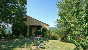 A house with a sloped roof and a small front porch.