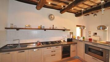 Panoramic Villa, 3 Bedrooms (Poggio Del Sole) | Private kitchen | Full-size fridge, microwave, stovetop, dishwasher