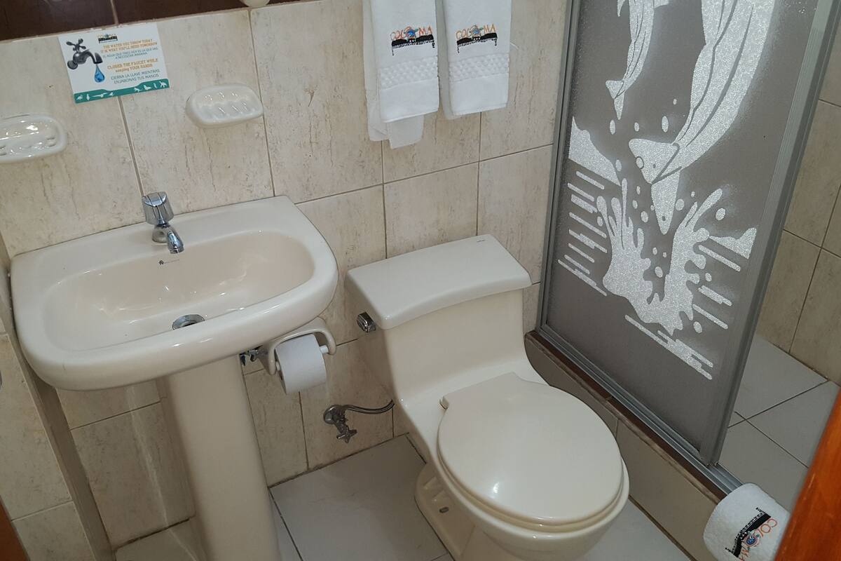 standard twin room, 2 single beds | bathroom | shower, designer toiletries, towels