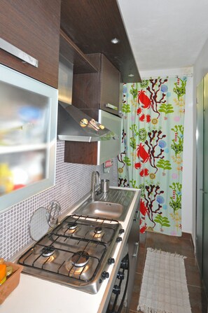 Apartment, 2 Bedrooms | Private kitchen | Full-size fridge, microwave, stovetop, cookware/dishes/utensils